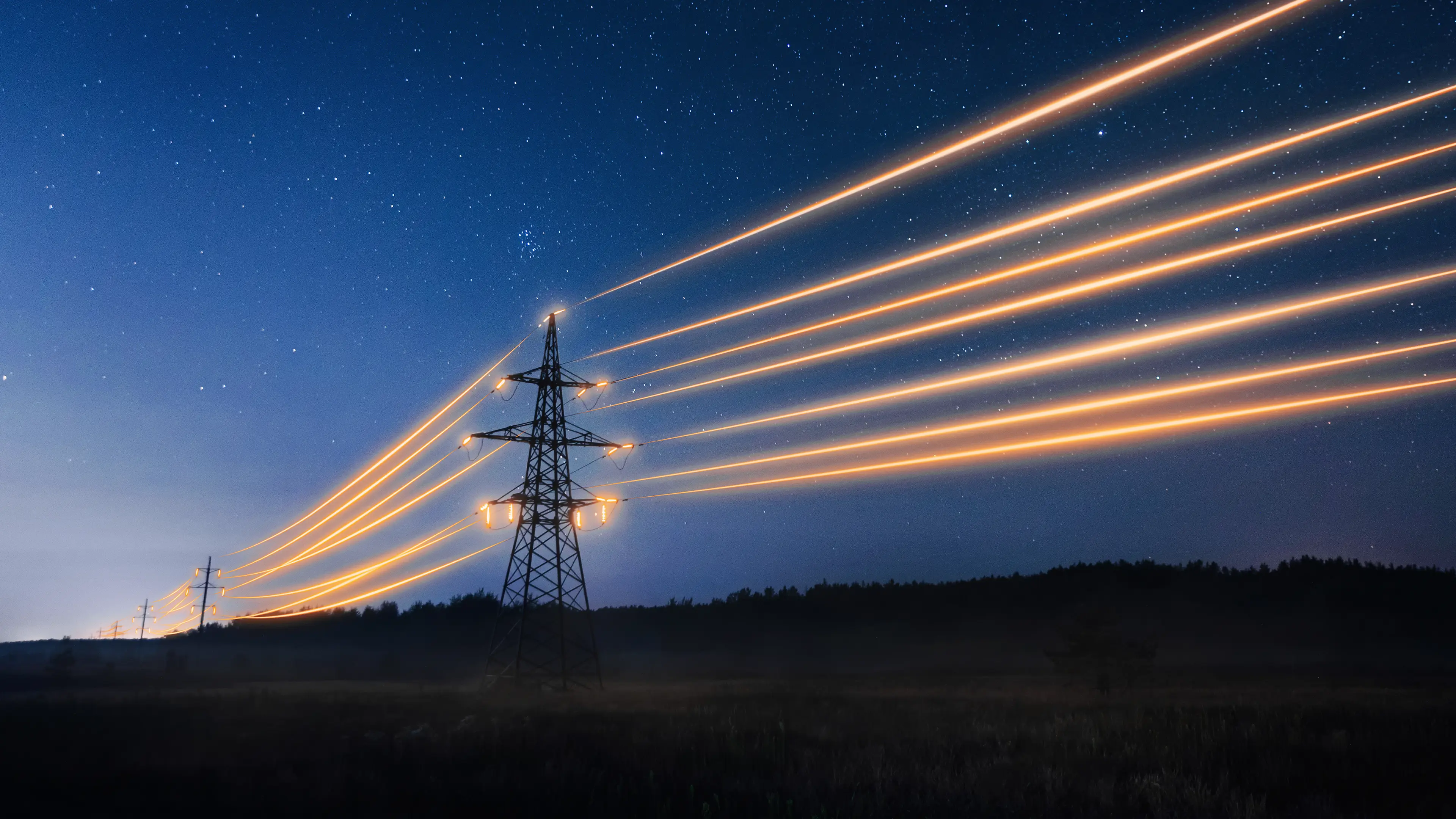 Starry night sky with glowing orange power lines and transmission towers conveying energy flow.